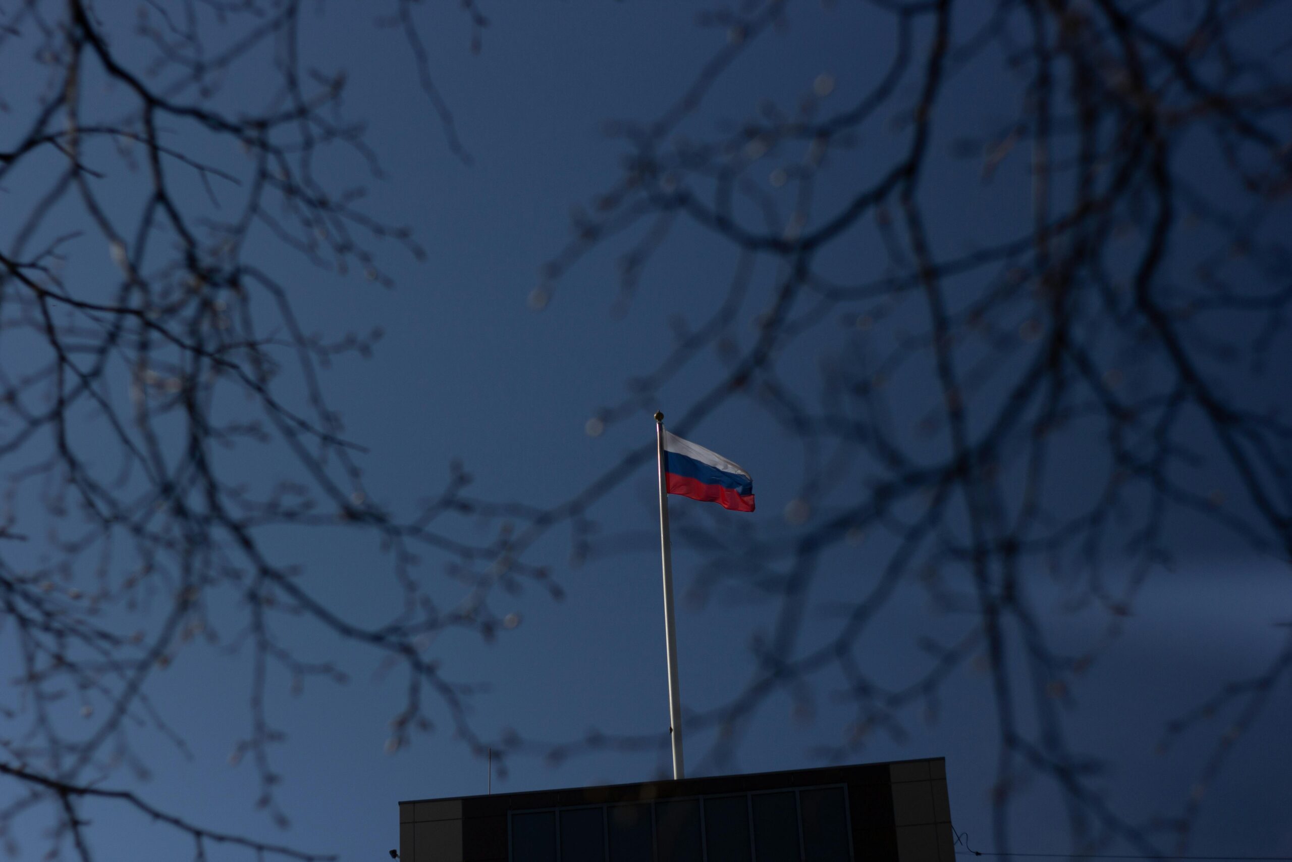 Russian flag on a pole.